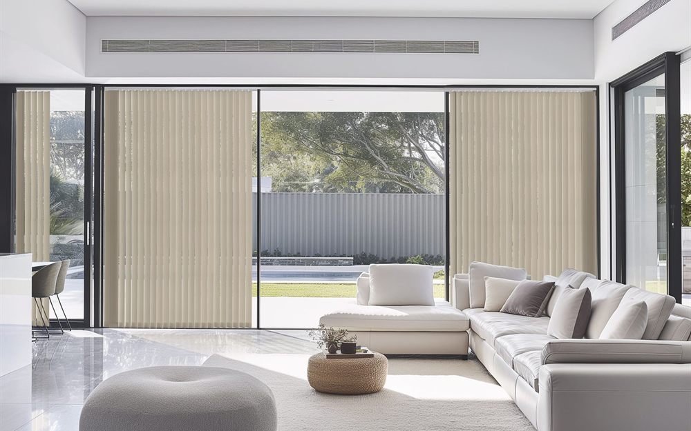 Vertical blind vanes drawn across a wide window